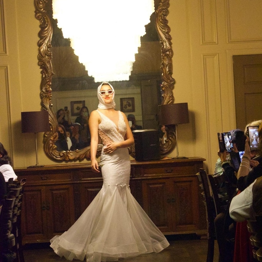 White/cream couture gown with beads